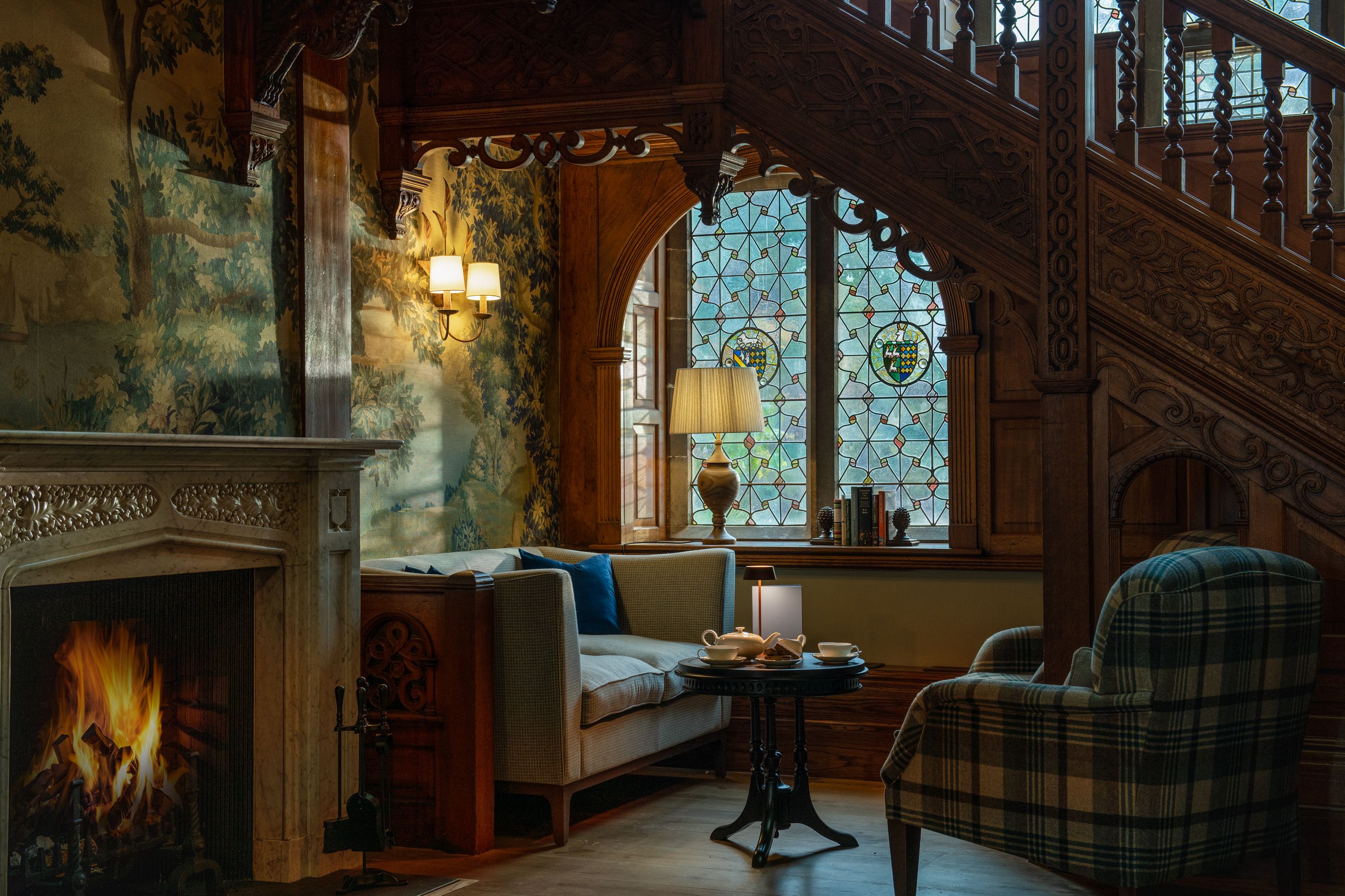 A cosy lounge area with a fireplace