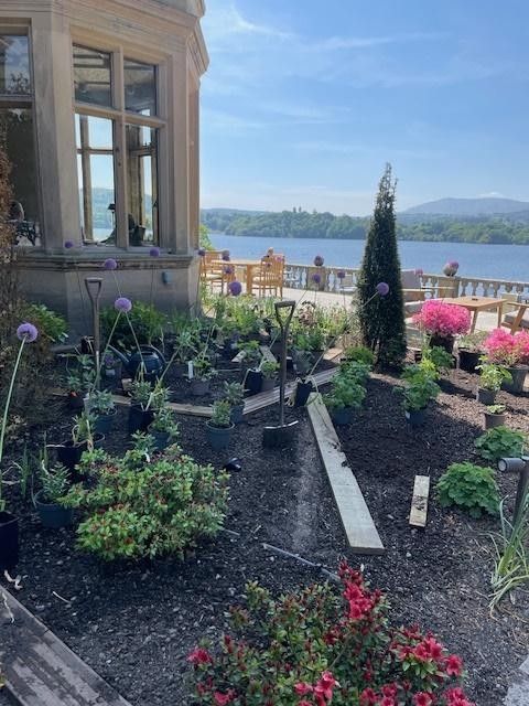 Flower rearrangement with view of Lake Windermere