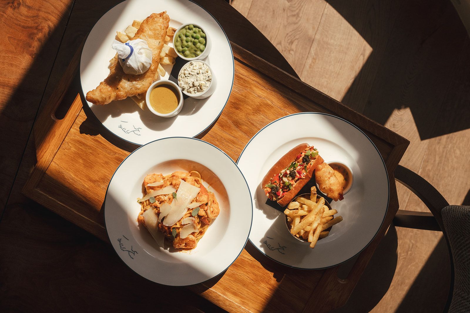 Fish and chips, lobster roll and prawn linguini
